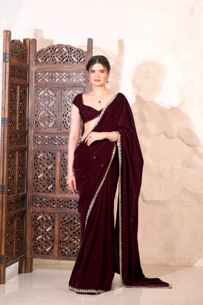 Nazia Wine Velvet Saree by Imagine By Shiwali featuring rich wine-colored velvet fabric and traditional drape style.