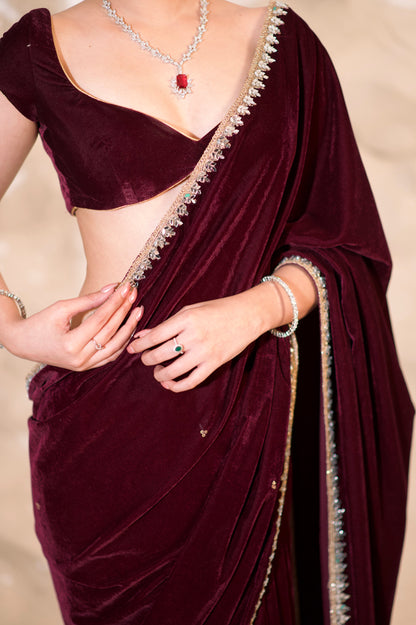 Nazia Wine Velvet Saree by Imagine By Shiwali, elegant deep wine-colored velvet fabric with intricate draping and traditional style.