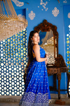 Radha Blue Anarkali dress by Imagine By Shiwali, featuring intricate embroidery and flowing fabric in shades of blue.