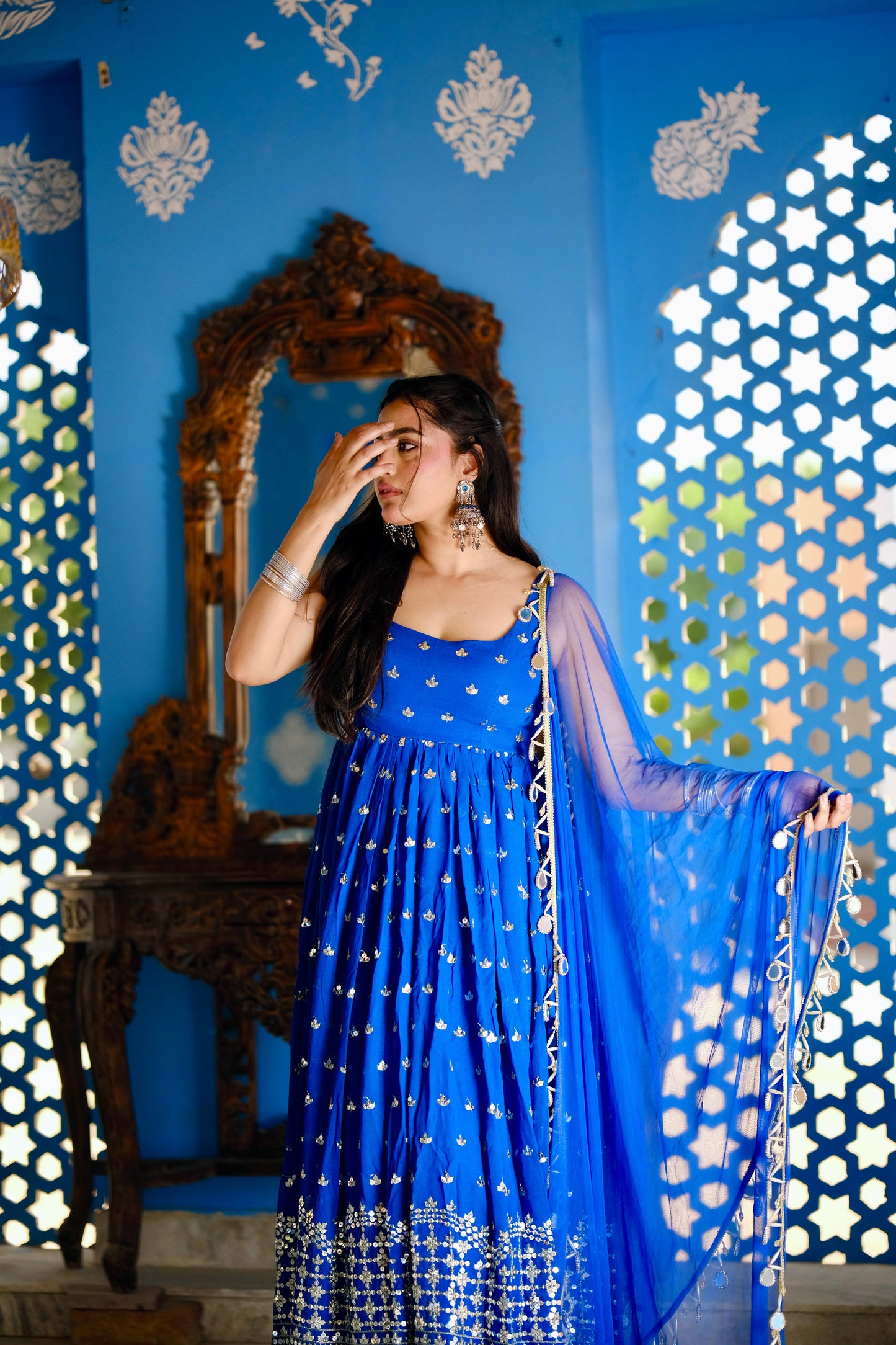 Blue Radha Anarkali dress by Imagine By Shiwali, featuring intricate embroidery and flowing fabric with a traditional style.