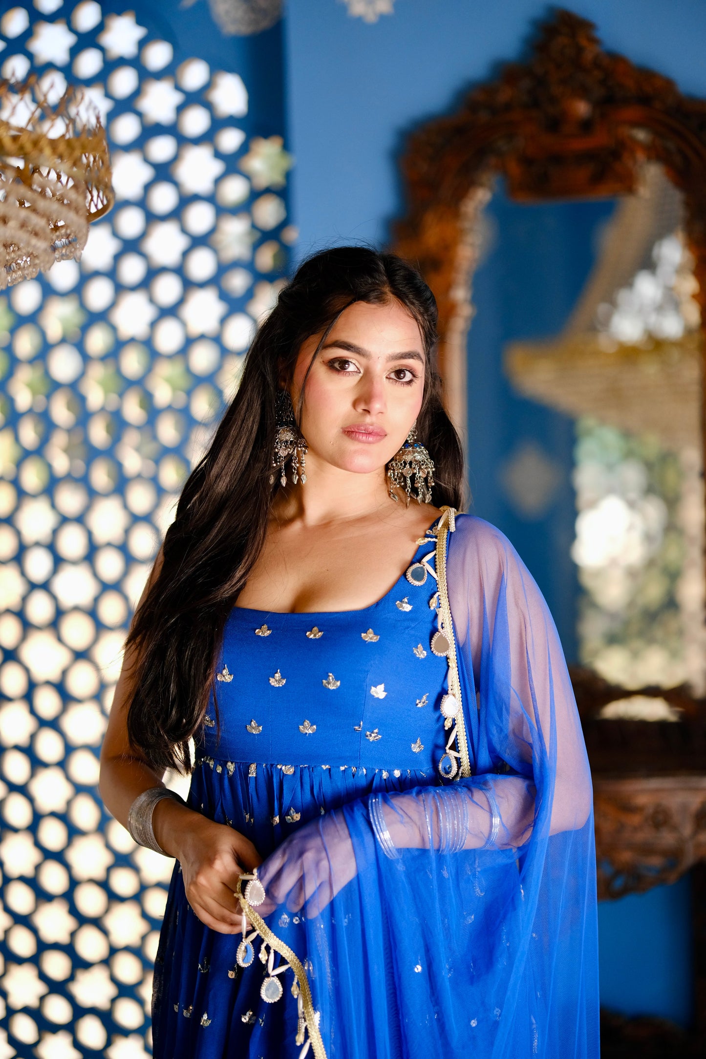 Imagine by Shiwali Radha Blue Anarkali dress featuring intricate embroidery and flowing fabric, ideal for traditional occasions.