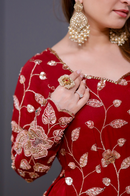 Red straight suit from Radha collection by Imagine By Shiwali, featuring traditional Indian design and vibrant fabric.