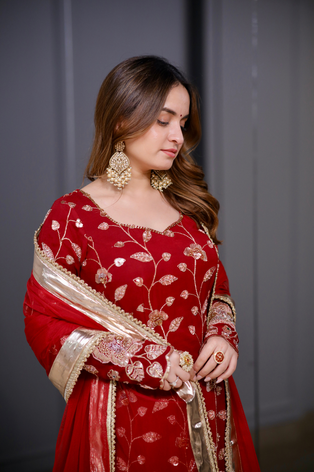 Radha red straight suit by Imagine By Shiwali featuring a vibrant red fabric and elegant straight silhouette.