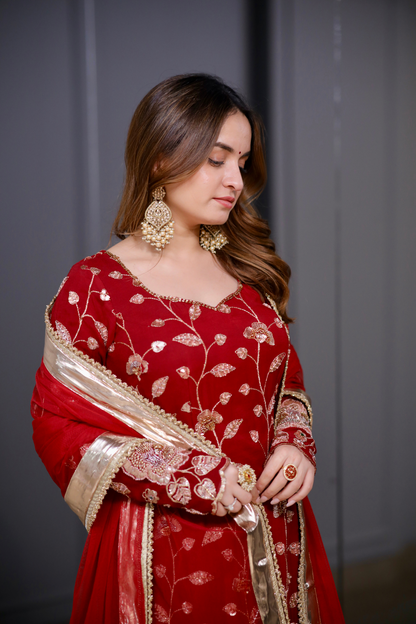 Radha red straight suit by Imagine By Shiwali featuring a vibrant red fabric and elegant straight silhouette.