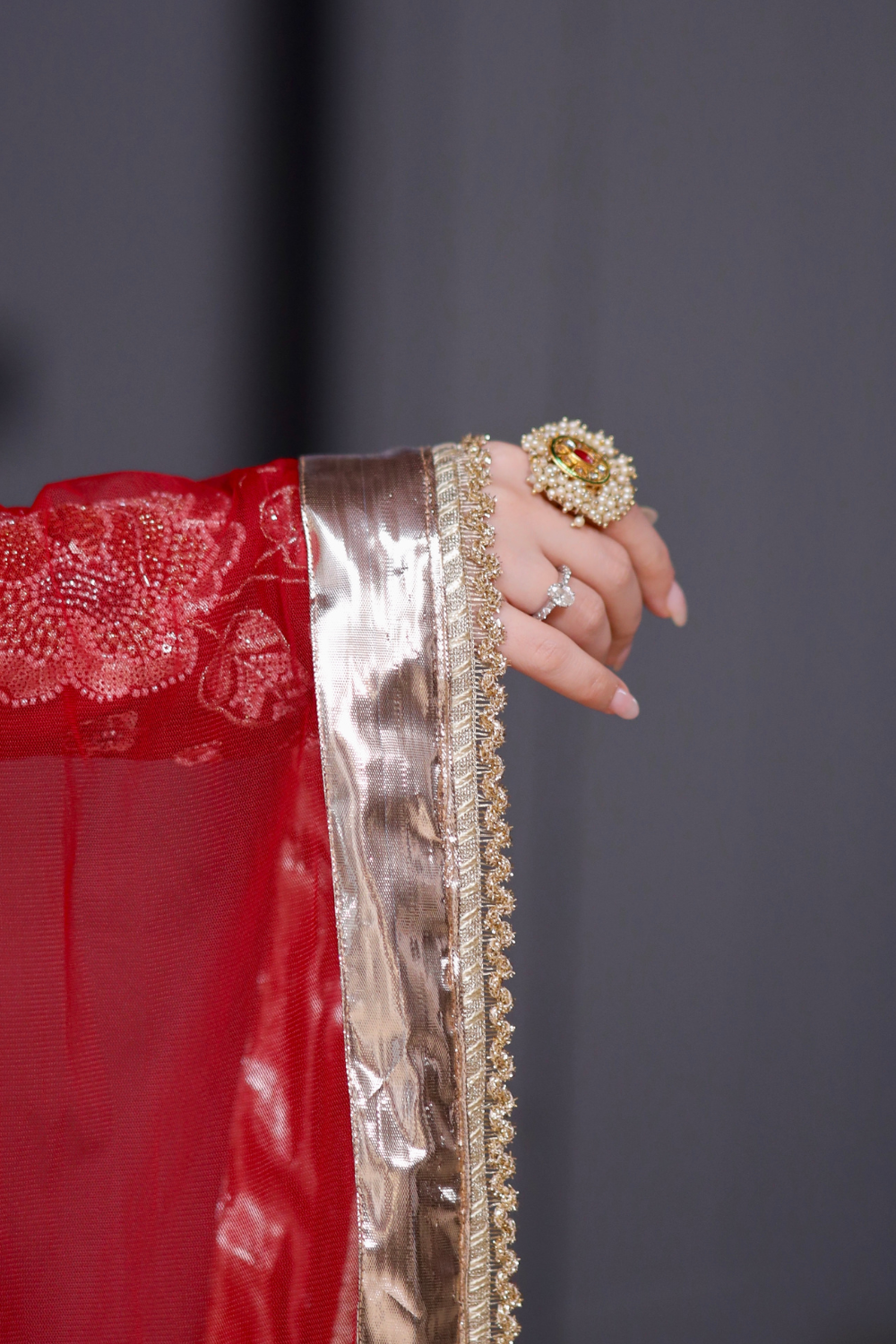 Red straight suit by Imagine By Shiwali, featuring a traditional design with intricate details and a vibrant appearance.