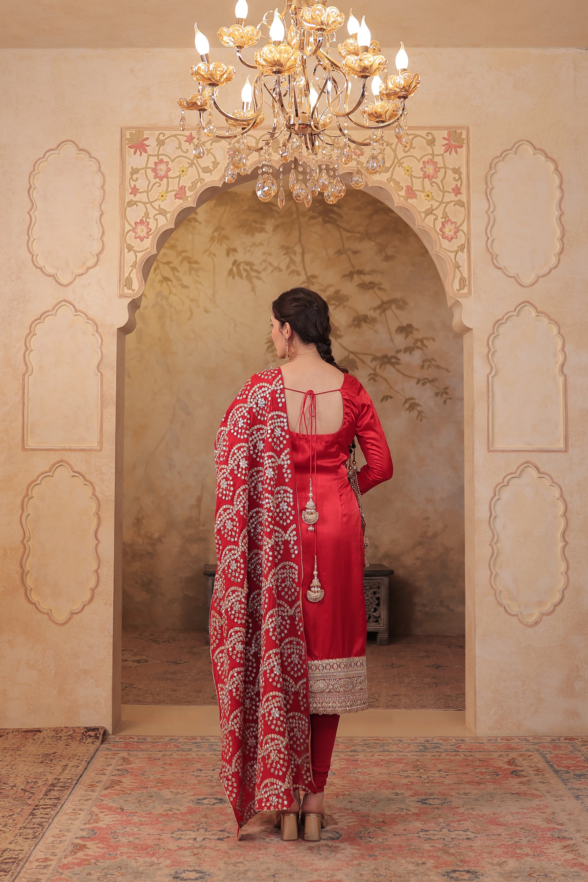 Red Rani Silk suit by Imagine By Shiwali, featuring intricate embroidery and traditional design on elegant silk fabric.