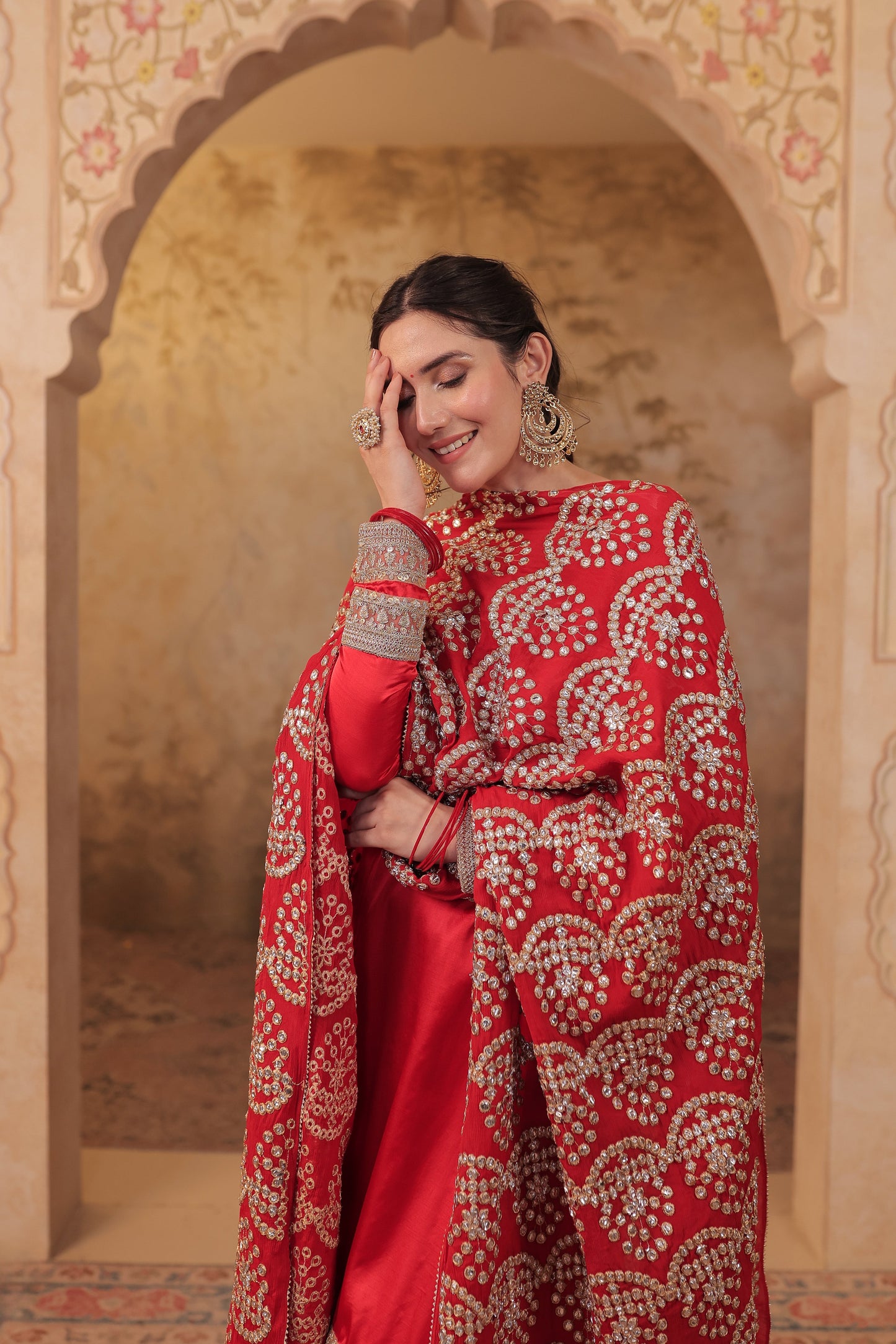 Red Rani Silk suit by Imagine By Shiwali, showcasing intricate silk fabric and traditional design in a vibrant, elegant style.