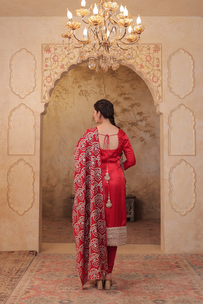 Red Rani Silk suit by Imagine By Shiwali, featuring intricate embroidery and traditional design, displayed on a mannequin.