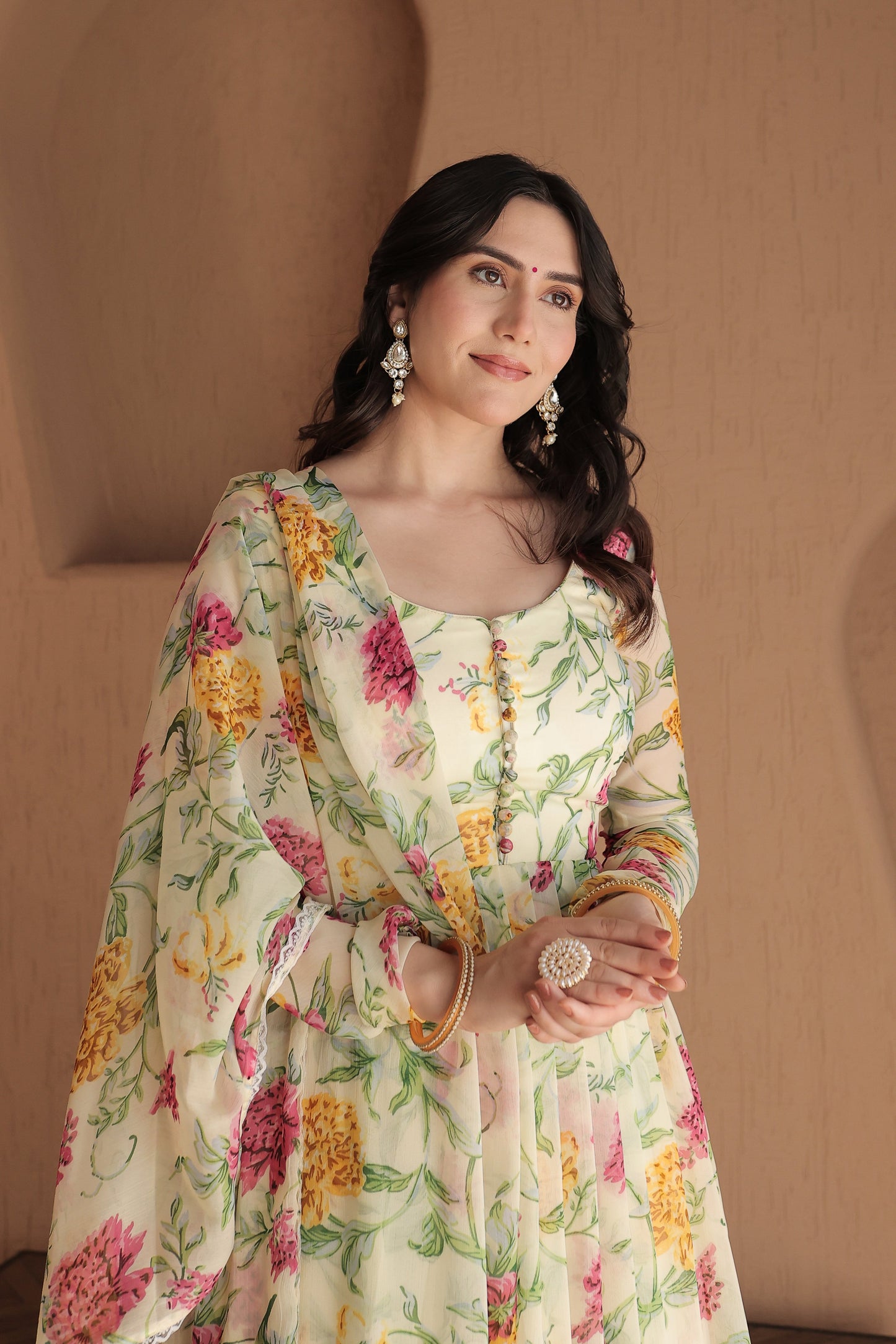 Beige floral Rasiya Anarkali dress by Imagine By Shiwali, featuring intricate embroidery and flowing silhouette.