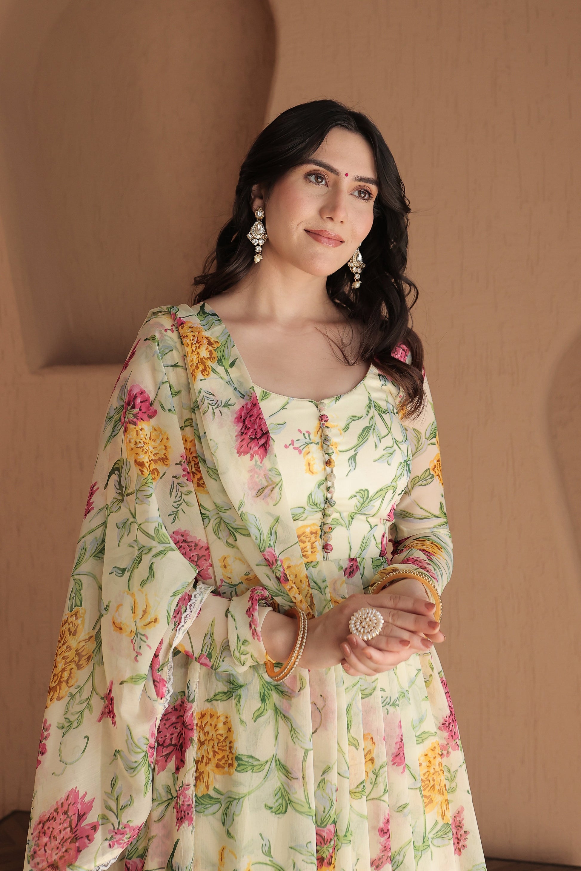 Beige floral Rasiya Anarkali dress by Imagine By Shiwali, featuring intricate embroidery and flowing silhouette.