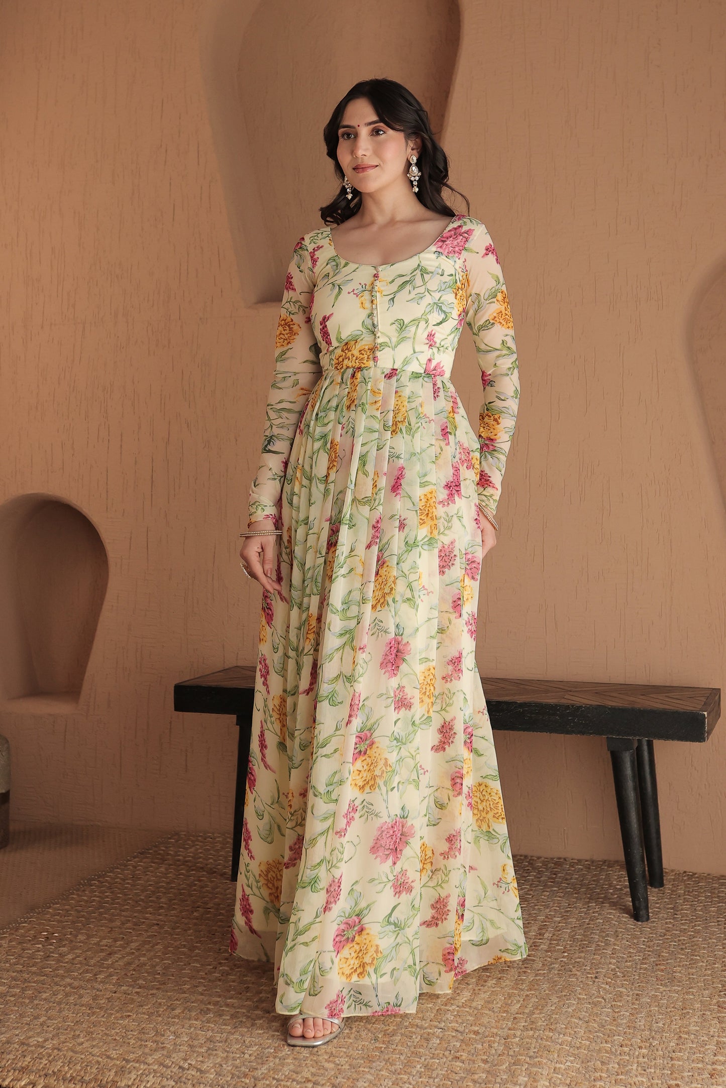 Imagine By Shiwali Rasiya beige floral anarkali dress with intricate embroidery and flowing fabric, displayed on a mannequin.