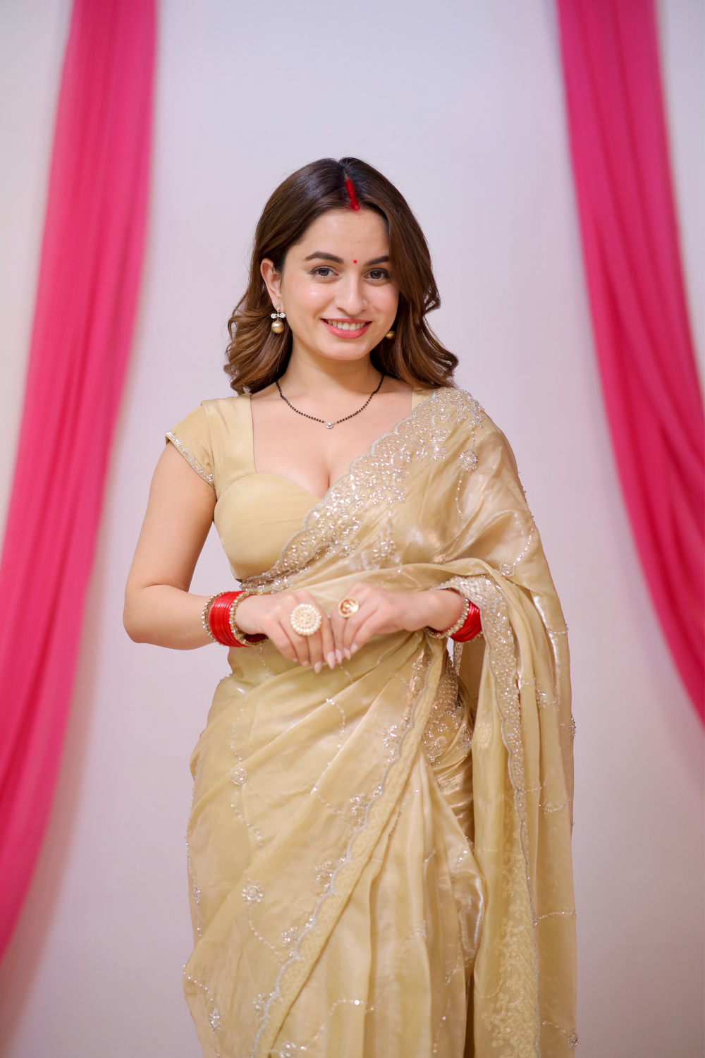 Golden Reva saree by Imagine By Shiwali featuring intricate detailing and elegant draping on a traditional fabric.