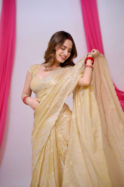 Gold Reva saree by Imagine By Shiwali featuring intricate patterns and elegant drape, perfect for festive occasions.