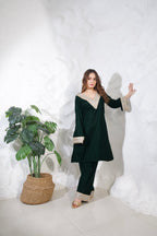 Green velvet co-ord set with a crop top and matching pants from Imagine By Shiwali Roza collection