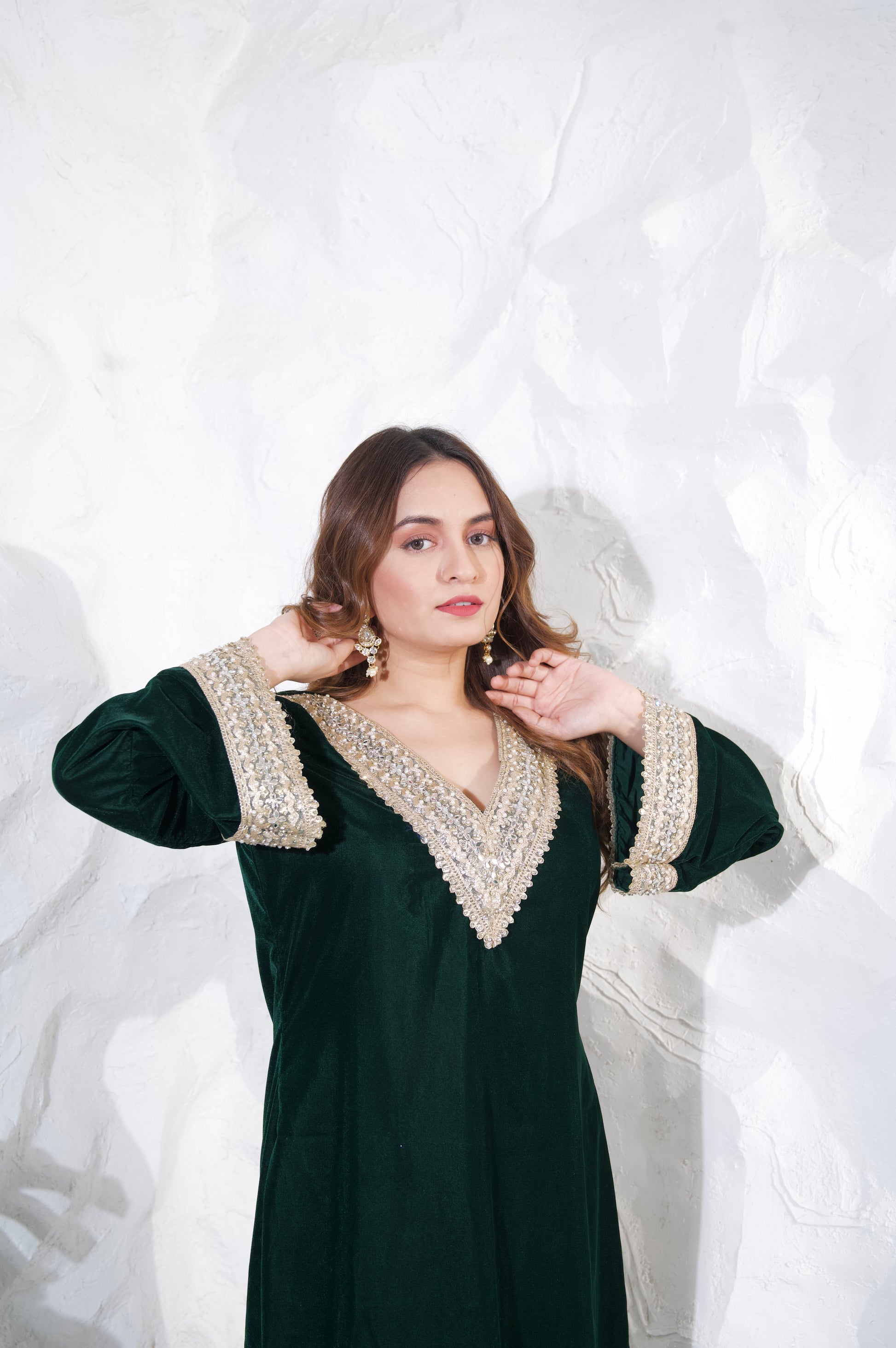 Green velvet co-ord set by Imagine By Shiwali featuring a stylish top and matching pants, perfect for elegant casual wear.