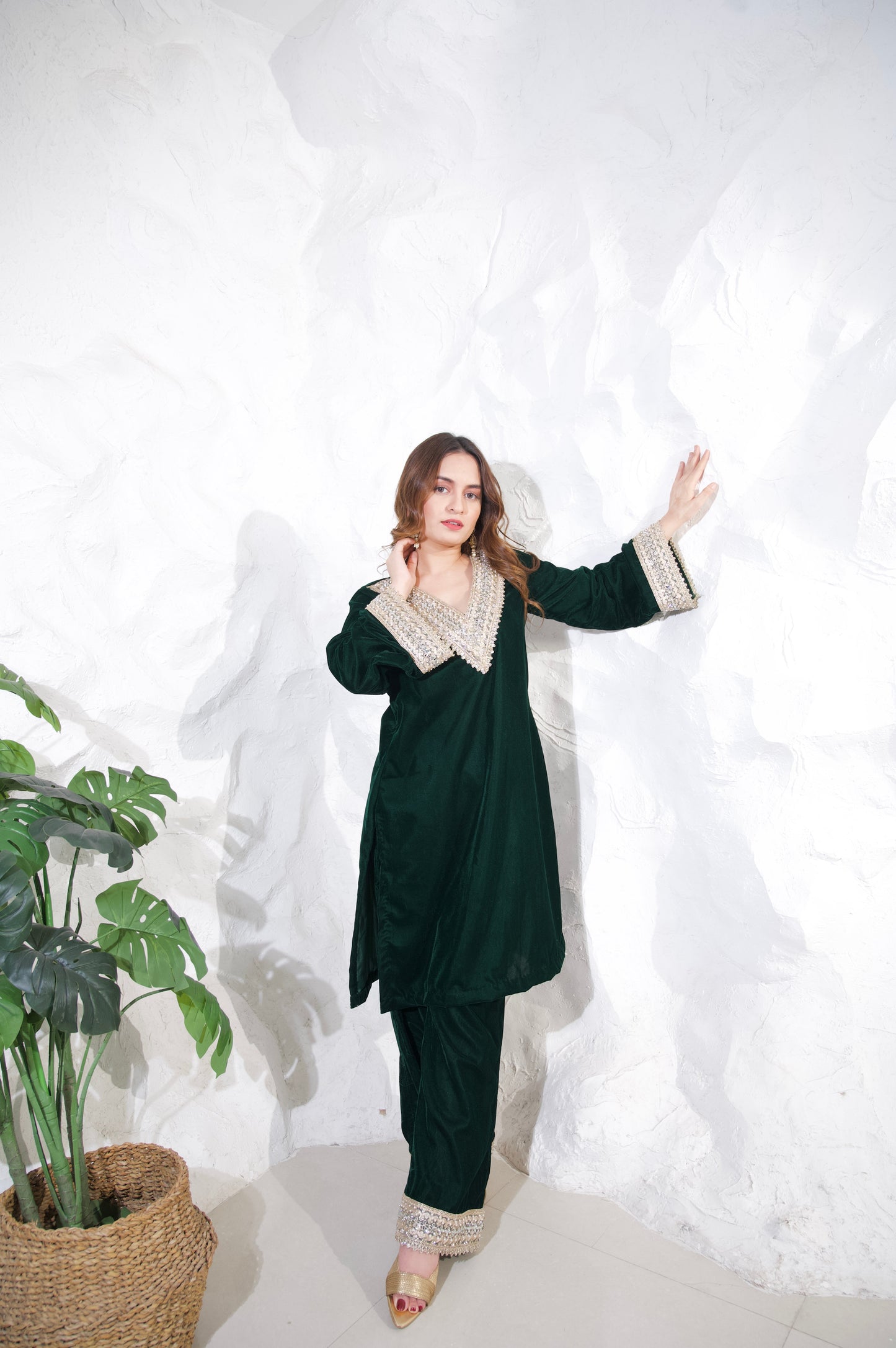 Green velvet co-ord set by Imagine By Shiwali featuring a fitted top and matching pants with a luxurious, soft texture.