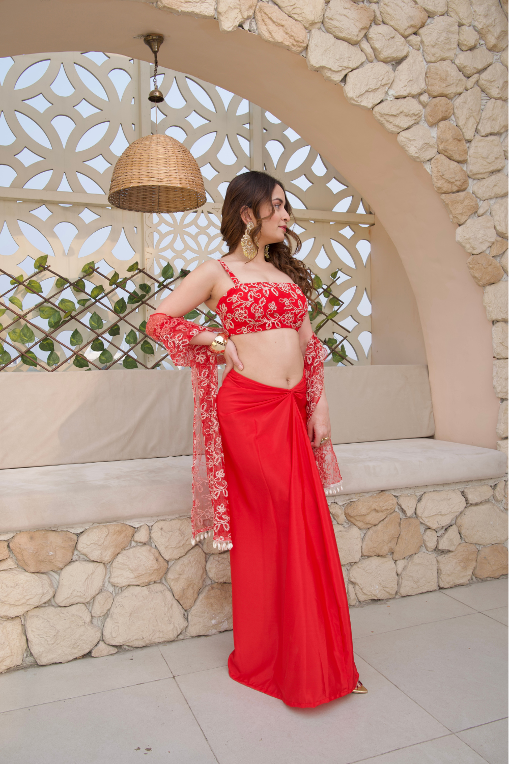 Sara red crop top and skirt set by Imagine By Shiwali, featuring a stylish coordinated outfit with a fitted crop top and matching skirt.