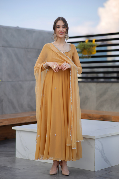 Brown Sharwari Anarkali dress by Imagine By Shiwali featuring intricate embroidery and a flowing silhouette.