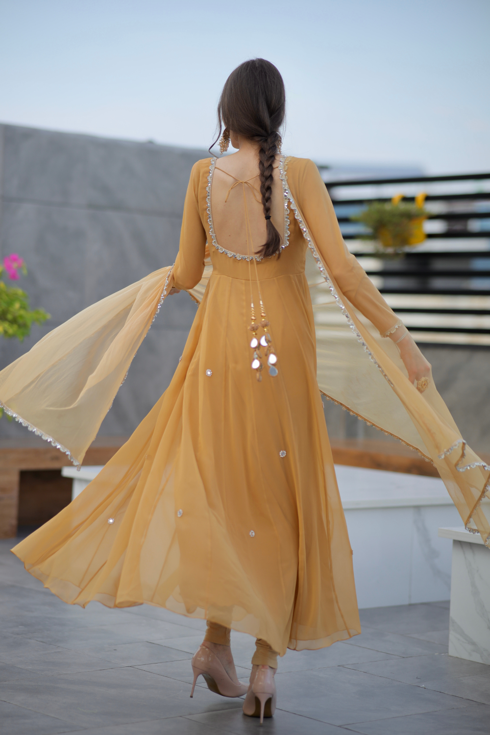 Brown Sharwari Anarkali dress by Imagine By Shiwali, featuring intricate embroidery and flowing fabric.