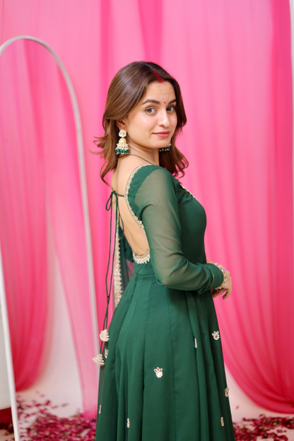 Green Sharwari Anarkali suit by Imagine By Shiwali featuring intricate embroidery and flowing fabric.