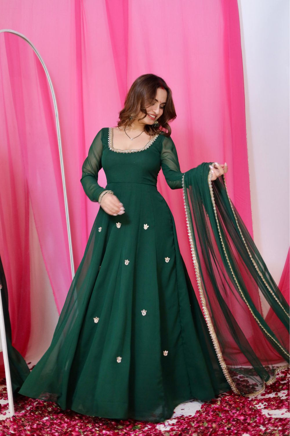 Green Sharwari Anarkali dress by Imagine By Shiwali, featuring intricate embroidery and flowing fabric.