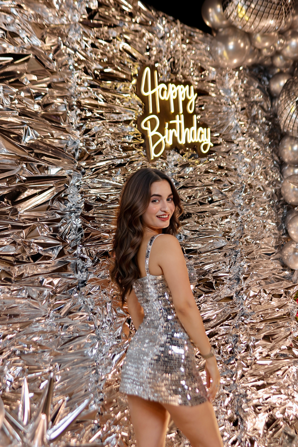 Sparkling silver bodycon dress by Imagine By Shiwali, fitted style with shimmering fabric and sleeveless design.