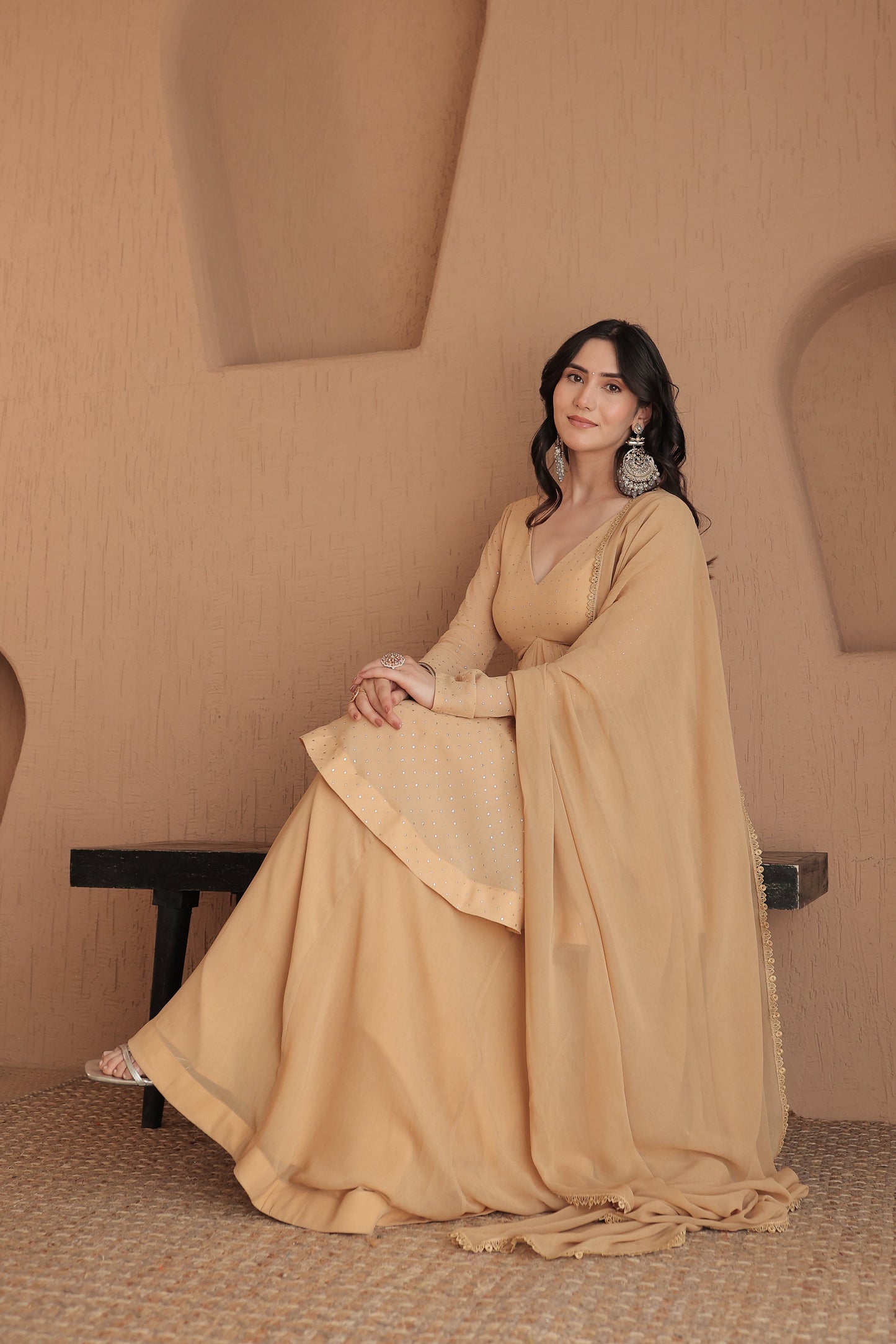Brown Suraiya peplum suit by Imagine By Shiwali, featuring a stylish peplum top and matching traditional bottom.