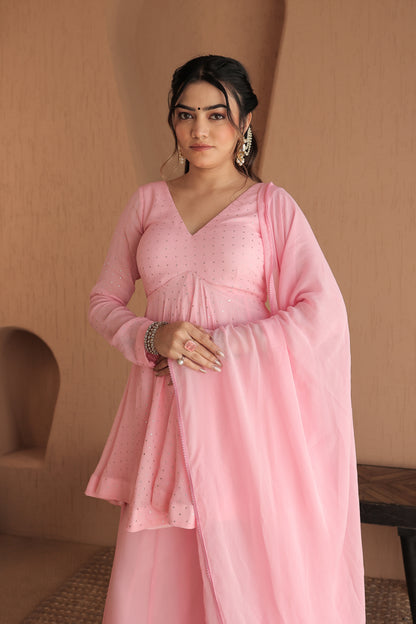 Pink Suraiya peplum suit by Imagine by Shiwali, featuring traditional embroidery and elegant design with matching dupatta.