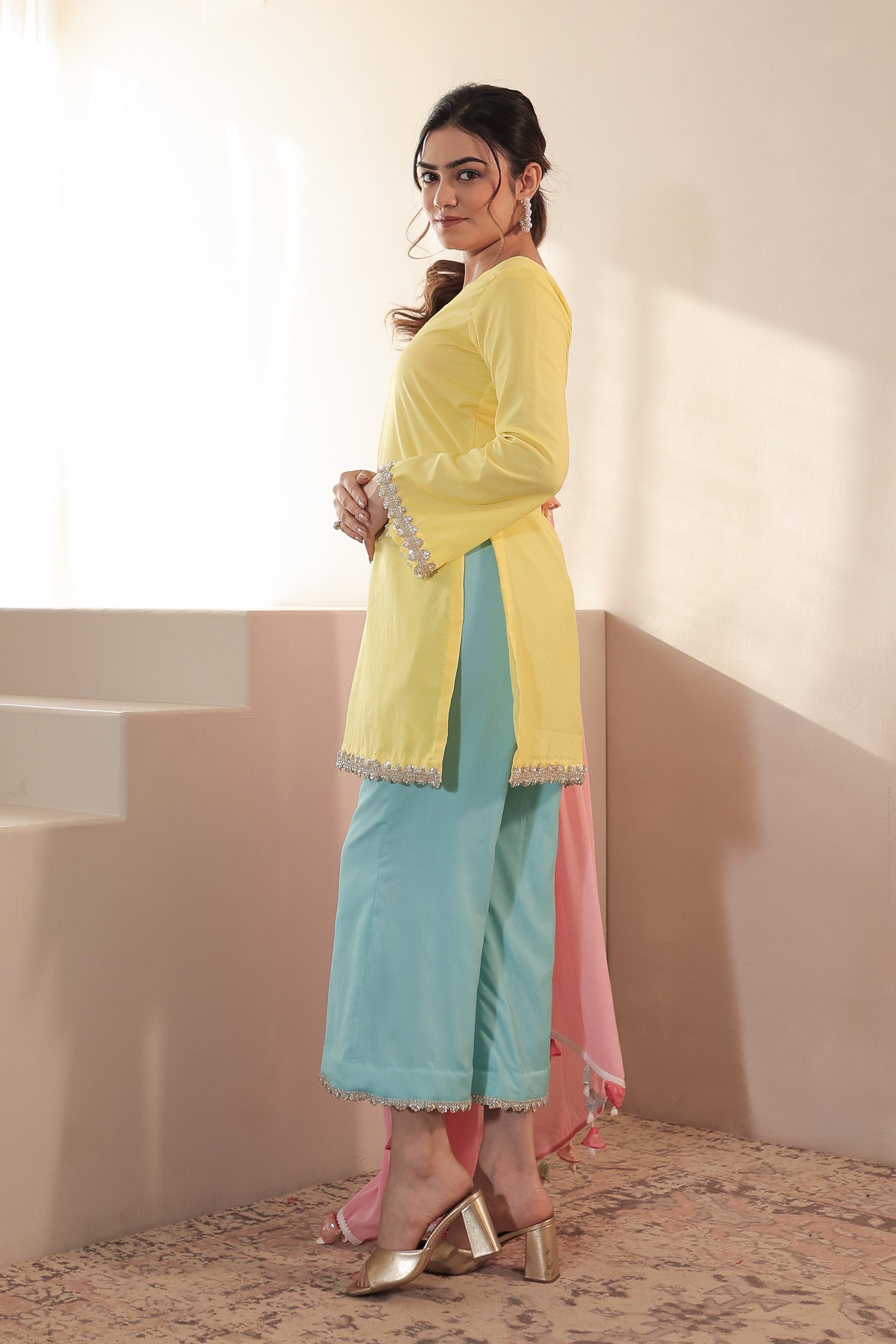 Imagine by Shiwali Taara 3-color straight suit featuring a sleek design and vibrant colors, displayed on a hanger.