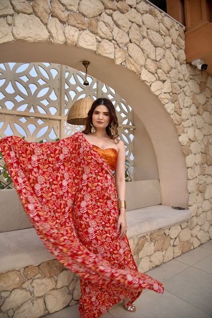 Red floral kaftan by Imagine By Shiwali featuring vibrant patterns and flowing fabric, perfect for casual or resort wear.